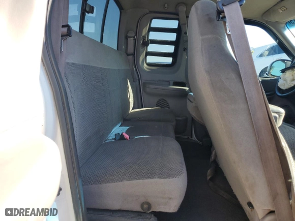 1999 Ford F-150 Work Series with VIN 1FTRX17WXXKB56340, listed as a Copart auction lot 42221615 with 0 mi miles and Salvage Title. Bid and sale history available at carsss.com. Image 10.