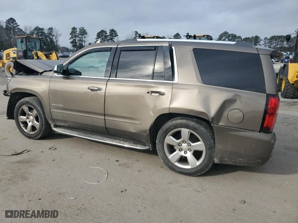 2016 Chevrolet Tahoe LTZ with VIN 1GNSKCKC9GR138032, listed as a Copart auction lot 43525425 with 126,424 mi miles and Salvage Title. Bid and sale history available at carsss.com. Image 2.