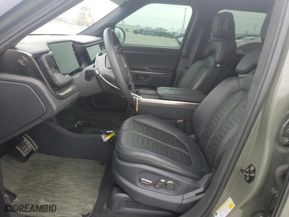 2022 Rivian R1T Launch Edition with VIN 7FCTGAAL2NN000433, listed as a Copart auction lot 46680705 with 0 mi miles and Salvage Title. Bid and sale history available at carsss.com. Image 7.