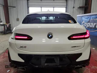 2023 BMW X4 xDrive30i with VIN 5UX33DT07P9P12954, listed as a Copart auction lot 42596275 with 27,590 mi miles and Salvage Title. Bid and sale history available at carsss.com. Image 6.