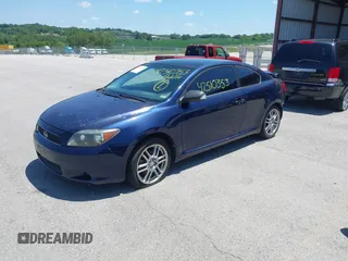 2007 Scion tC Spec with VIN JTKDE177370164437, listed as a IAAI auction lot 42510353 with 129,642 mi miles and . Bid and sale history available at DreamBid. Image 2.