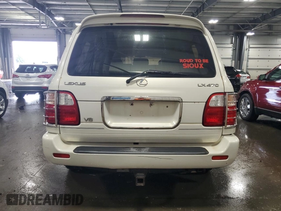 2000 Lexus LX 470 z VIN JT6HT00W9Y0109333, wystawiony jako Copart lot #47589965 z przebiegiem 261 766 mil mil oraz Szkody całkowita. Historia ofert i sprzedaży dostępna na DreamBid. Obrazek 6.