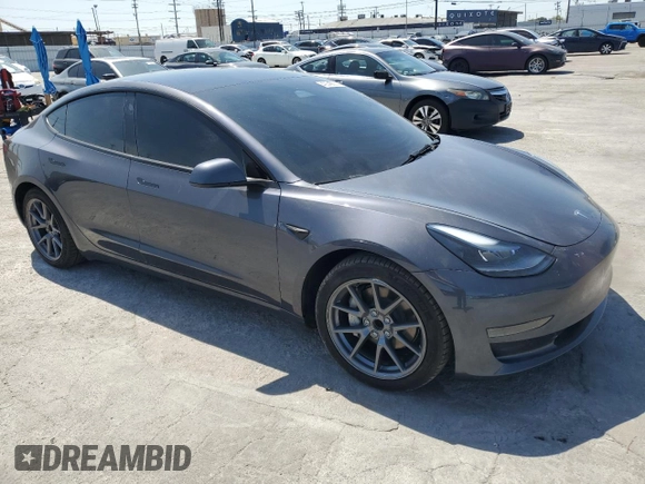 2023 Tesla Model 3 with VIN 5YJ3E1EA8PF616210, listed as a Copart auction lot 49340685 with 38,483 mi miles and Salvage Title. Bid and sale history available at DreamBid. Image 4.