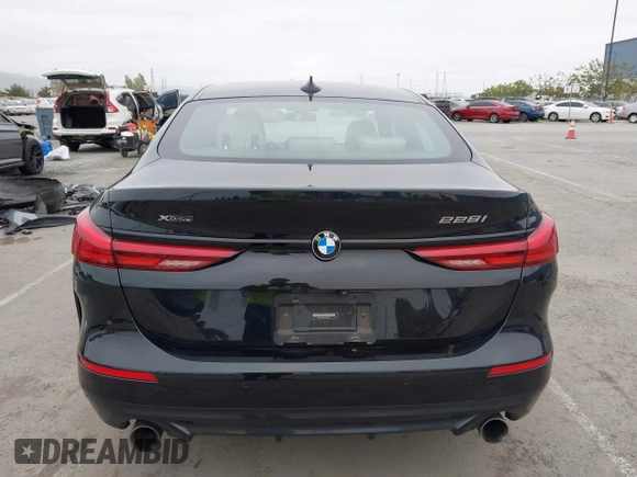 2020 BMW 2 Series 228i xDrive with VIN WBA73AK01L7F85126, listed as a IAAI auction lot 42110803 with 33,411 mi miles and . Bid and sale history available at carsss.com. Image 16.