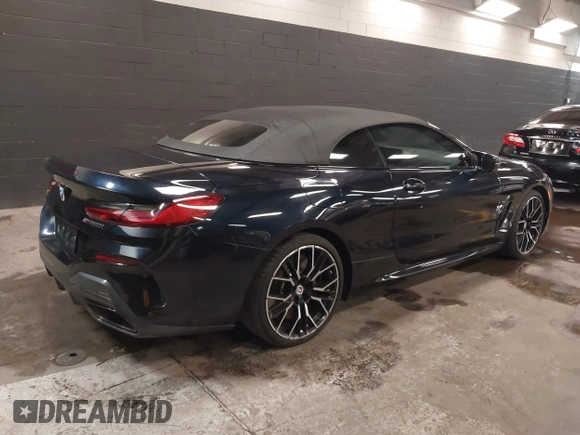 2023 BMW 8 Series with VIN WBAFY4C01PCM52812, listed as a IAAI auction lot 41967777 with 12,490 mi miles and . Bid and sale history available at DreamBid. Image 4.