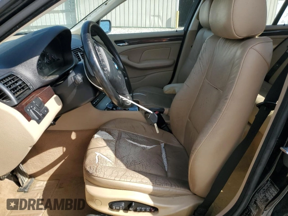 2004 BMW 3 Series 325xi with VIN WBAEU33404PR08565, listed as a Copart auction lot 57865215 with 253,784 mi miles and Salvage title. Bid and sale history available at DreamBid. Image 7.