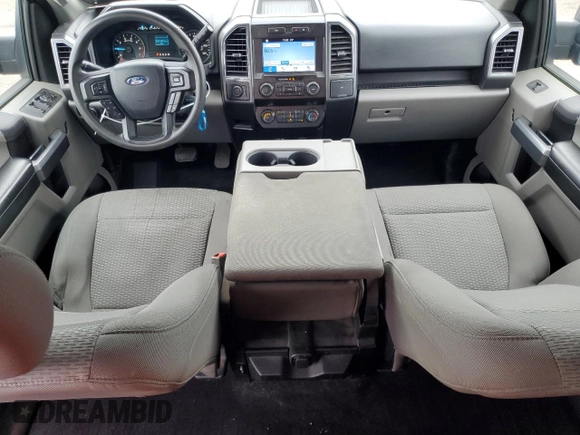 2019 Ford F-150 XL with VIN 1FTEW1E54KFA20203, listed as a Copart auction lot 64373765 with 79,550 mi miles and Salvage title. Bid and sale history available at DreamBid. Image 8.