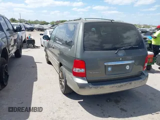 2004 Kia Sedona LX with VIN KNDUP131546549302, listed as a IAAI auction lot 41819215 with 125,881 mi miles. Bid and sale history available at carsss.com. Image 3.