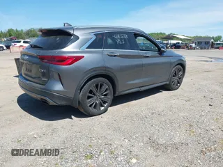 2020 Infiniti QX50 Luxe z VIN 3PCAJ5M39LF113955, wystawiony jako IAAI lot #42103238 z przebiegiem 94 886 mil mil oraz . Historia ofert i sprzedaży dostępna na DreamBid. Obrazek 4.