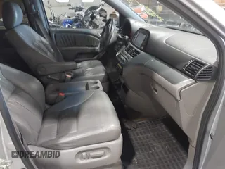 2010 Honda Odyssey EX-L z VIN 5FNRL3H75AB009698, wystawiony jako IAAI lot #42855966 z przebiegiem 215 138 mil mil oraz . Historia ofert i sprzedaży dostępna na DreamBid. Obrazek 5.