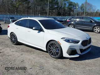 2021 BMW 2 Series M235i xDrive with VIN WBA13AL06M7G61056, listed as a IAAI auction lot 41140205 with 49,413 mi miles and . Bid and sale history available at DreamBid. Image 1.