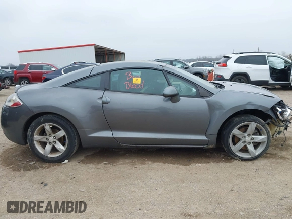 2006 Mitsubishi Eclipse GS z VIN 4A3AK24F06E044016, wystawiony jako IAAI lot #41501136 z przebiegiem Nie podano mil oraz . Historia ofert i sprzedaży dostępna na DreamBid. Obrazek 13.