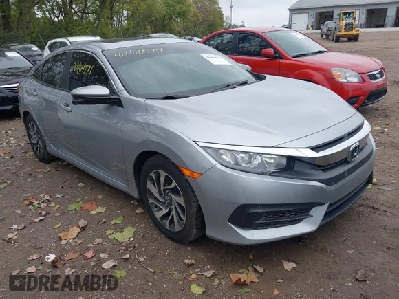 2018 Honda Civic Sedan EX with VIN 19XFC2F72JE034905, listed as a IAAI auction lot 40464574 with 68,942 mi miles. Bid and sale history available at carsss.com. Image 1.