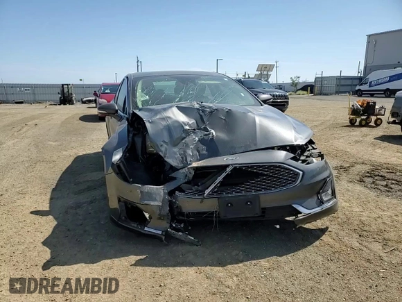 2020 Ford Fusion Titanium with VIN 3FA6P0K92LR115615, listed as a Copart auction lot 60471975 with 73,069 mi miles and Salvage title. Bid and sale history available at DreamBid. Image 14.