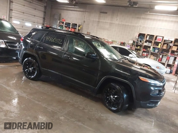 2014 Jeep Cherokee Latitude with VIN 1C4PJMCS0EW291135, listed as a IAAI auction lot 41860372 with 171,524 mi miles and . Bid and sale history available at DreamBid. Image 1.