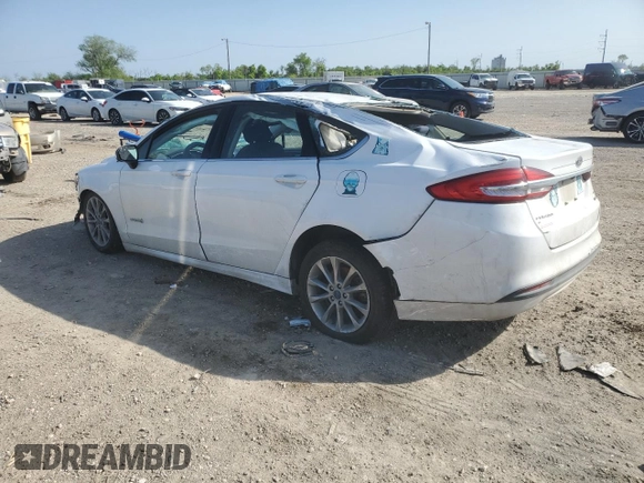 2017 Ford Fusion Hybrid SE с VIN 3FA6P0LU8HR356816, выставлен на аукционе Copart как лот 51005915 с пробегом Не указан миль и Списание • Salvage title. История ставок и продаж доступна на DreamBid. Изображение 2.