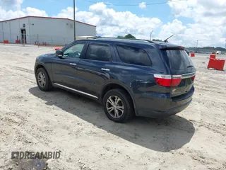 2013 Dodge Durango Crew with VIN 1C4RDHDG7DC657898, listed as a IAAI auction lot 42522353 with 234,483 mi miles and . Bid and sale history available at DreamBid. Image 3.