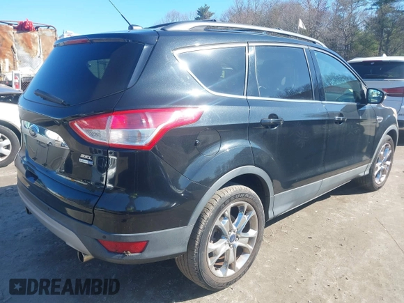 2013 Ford Escape SEL with VIN 1FMCU9HX3DUC18192, listed as a IAAI auction lot 41974404 with 61,054 mi miles. Bid and sale history available at carsss.com. Image 4.