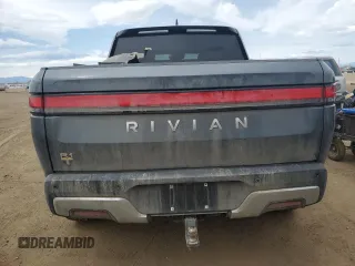 2023 Rivian R1T Adventure with VIN 7FCTGAAA3PN000801, listed as a Copart auction lot 51600895 with 19,486 mi miles and Salvage Title. Bid and sale history available at carsss.com. Image 6.