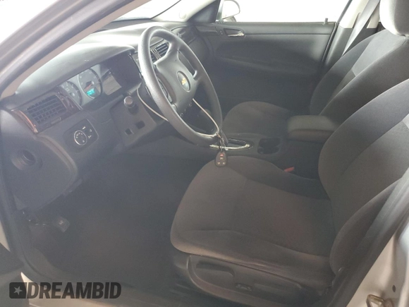 2016 Chevrolet Impala LS with VIN 2G1WA5E30G1151063, listed as a Copart auction lot 59731795 with 63,463 mi miles and Salvage title. Bid and sale history available at DreamBid. Image 7.