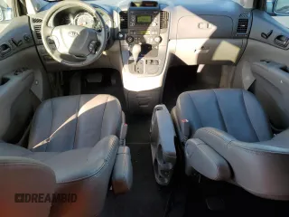2009 Kia Sedona EX with VIN KNDMB233196275030, listed as a Copart auction lot 71997154 with 96,777 mi miles and Salvage Title. Bid and sale history available at carsss.com. Image 8.