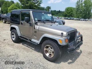 2004 Jeep Wrangler SE with VIN 1J4FA29164P797604, listed as a Copart auction lot 59978155 with 166,888 mi miles and Clean title. Bid and sale history available at DreamBid. Image 4.