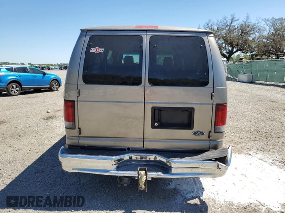 2012 Ford Econoline Passenger XL with VIN 1FBSS3BS8CDB20584, listed as a Copart auction lot 49483935 with 176,388 mi miles and Salvage Title. Bid and sale history available at DreamBid. Image 6.