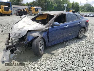 2019 Kia Optima LX z VIN 5XXGT4L38KG369032, wystawiony jako Copart lot #57117195 z przebiegiem Nie podano mil oraz Szkoda całkowita • Salvage title. Historia ofert i sprzedaży dostępna na DreamBid. Obrazek 1.