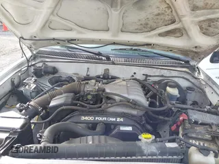 2004 Toyota Tacoma z VIN 5TEWN72N54Z463111, wystawiony jako IAAI lot #42093928 z przebiegiem 147 136 mil mil oraz . Historia ofert i sprzedaży dostępna na DreamBid. Obrazek 10.