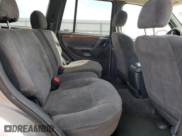 1999 Jeep Grand Cherokee Limited with VIN 1J4GW68N4XC663476, listed as a Copart auction lot 52449925 with 174,583 mi miles and Salvage Title. Bid and sale history available at carsss.com. Image 11.