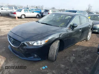 2015 Mazda 6 i Sport with VIN JM1GJ1U5XF1214570, listed as a IAAI auction lot 41003789 with 99,844 mi miles. Bid and sale history available at carsss.com. Image 2.
