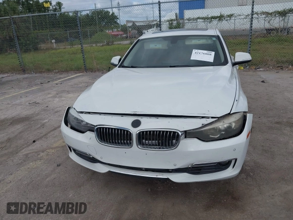 2012 BMW 3 Series 328i with VIN WBA3A5C57CF347953, listed as a IAAI auction lot 42176008 with 140,598 mi miles and . Bid and sale history available at carsss.com. Image 6.