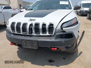 2015 Jeep Cherokee Trailhawk z VIN 1C4PJMBS5FW574102, wystawiony jako IAAI lot #42278805 z przebiegiem 164 250 mil mil oraz . Historia ofert i sprzedaży dostępna na DreamBid. Obrazek 6.