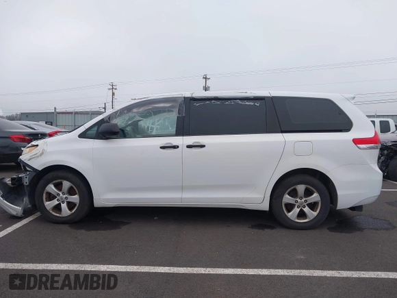 2012 Toyota Sienna with VIN 5TDZK3DCXCS271365, listed as a IAAI auction lot 38121628 with 101,756 mi miles and . Bid and sale history available at DreamBid. Image 13.