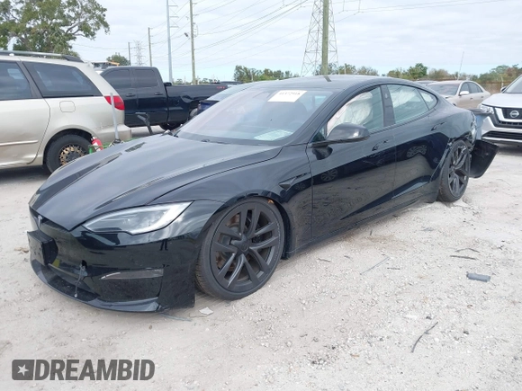 2023 Tesla Model S with VIN 5YJSA1E52PF500088, listed as a IAAI auction lot 41372918 with Not provided miles and . Bid and sale history available at DreamBid. Image 2.