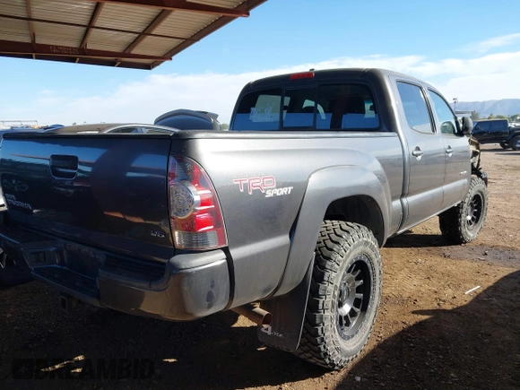 2011 Toyota Tacoma with VIN 3TMMU4FN0BM032561, listed as a IAAI auction lot 41190472 with 188,862 mi miles and . Bid and sale history available at DreamBid. Image 4.
