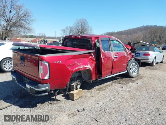 2015 GMC Canyon 4WD SLT z VIN 1GTG6CE38F1266466, wystawiony jako IAAI lot #41822501 z przebiegiem 26 479 mil mil oraz . Historia ofert i sprzedaży dostępna na DreamBid. Obrazek 4.