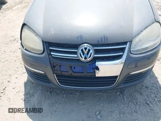 2007 Volkswagen Jetta 2.5 z VIN 3VWRF71K67M131095, wystawiony jako IAAI lot #42561971 z przebiegiem 127 592 mil mil oraz . Historia ofert i sprzedaży dostępna na DreamBid. Obrazek 6.