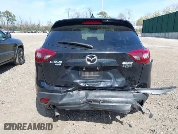 2016 Mazda CX-5 Grand Touring with VIN JM3KE4DY8G0639570, listed as a IAAI auction lot 42098512 with 126,541 mi miles and . Bid and sale history available at carsss.com. Image 16.