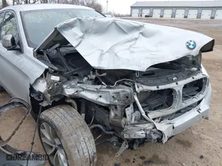 2018 BMW X6 xDrive35i with VIN 5UXKU2C50J0X49445, listed as a IAAI auction lot 41449077 with 130,912 mi miles. Bid and sale history available at carsss.com. Image 6.