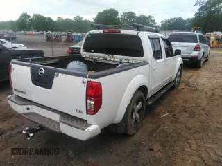 2006 Nissan Frontier SE with VIN 1N6AD07U66C441928, listed as a IAAI auction lot 42093470 with 271,935 mi miles and . Bid and sale history available at DreamBid. Image 4.