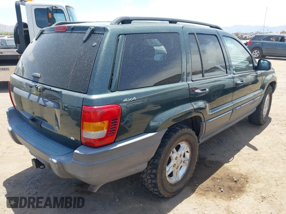2001 Jeep Grand Cherokee Laredo with VIN 1J4GW48N51C612600, listed as a IAAI auction lot 42348631 with 165,918 mi miles and . Bid and sale history available at DreamBid. Image 4.