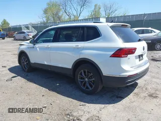 2023 Volkswagen Tiguan SE with VIN 3VVMB7AX4PM128427, listed as a IAAI auction lot 42054477 with 29,731 mi miles and . Bid and sale history available at DreamBid. Image 3.