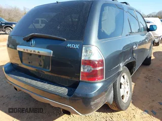 2005 Acura MDX with VIN 2HNYD18205H531571, listed as a IAAI auction lot 41405975 with 127,354 mi miles. Bid and sale history available at carsss.com. Image 4.