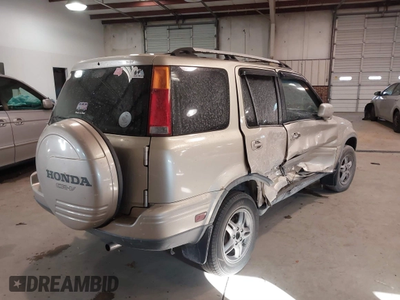2000 Honda CR-V SE with VIN JHLRD1879YC037127, listed as a IAAI auction lot 41285624 with 246,170 mi miles. Bid and sale history available at carsss.com. Image 4.