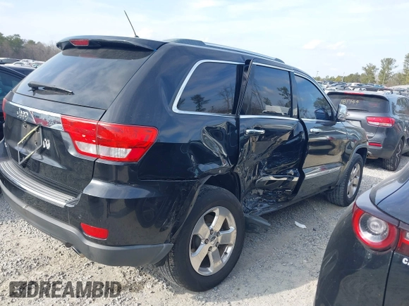 2013 Jeep Grand Cherokee Limited with VIN 1C4RJEBGXDC520609, listed as a IAAI auction lot 41493503 with 173,020 mi miles. Bid and sale history available at carsss.com. Image 13.