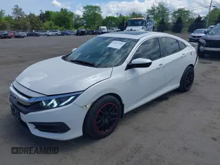 2016 Honda Civic EX with VIN 19XFC2F74GE081734, listed as a IAAI auction lot 42157310 with 152,475 mi miles and . Bid and sale history available at DreamBid. Image 2.