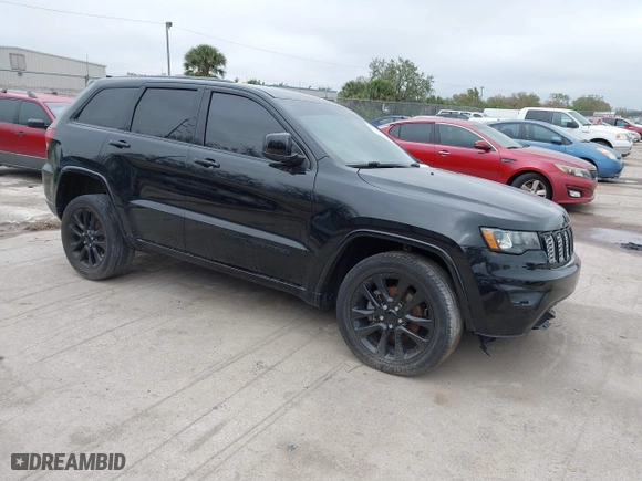 2018 Jeep Grand Cherokee Laredo E with VIN 1C4RJFAG7JC312948, listed as a IAAI auction lot 41624027 with 116,763 mi miles. Bid and sale history available at carsss.com. Image 1.