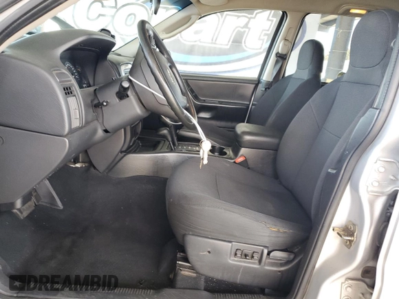 2003 Jeep Grand Cherokee Laredo with VIN 1J4GW48S23C617830, listed as a Copart auction lot 57481565 with 122,745 mi miles and Salvage title. Bid and sale history available at DreamBid. Image 7.