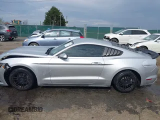 2015 Ford Mustang V6 with VIN 1FA6P8AM3F5348012, listed as a IAAI auction lot 41910661 with 144,584 mi miles and . Bid and sale history available at DreamBid. Image 14.